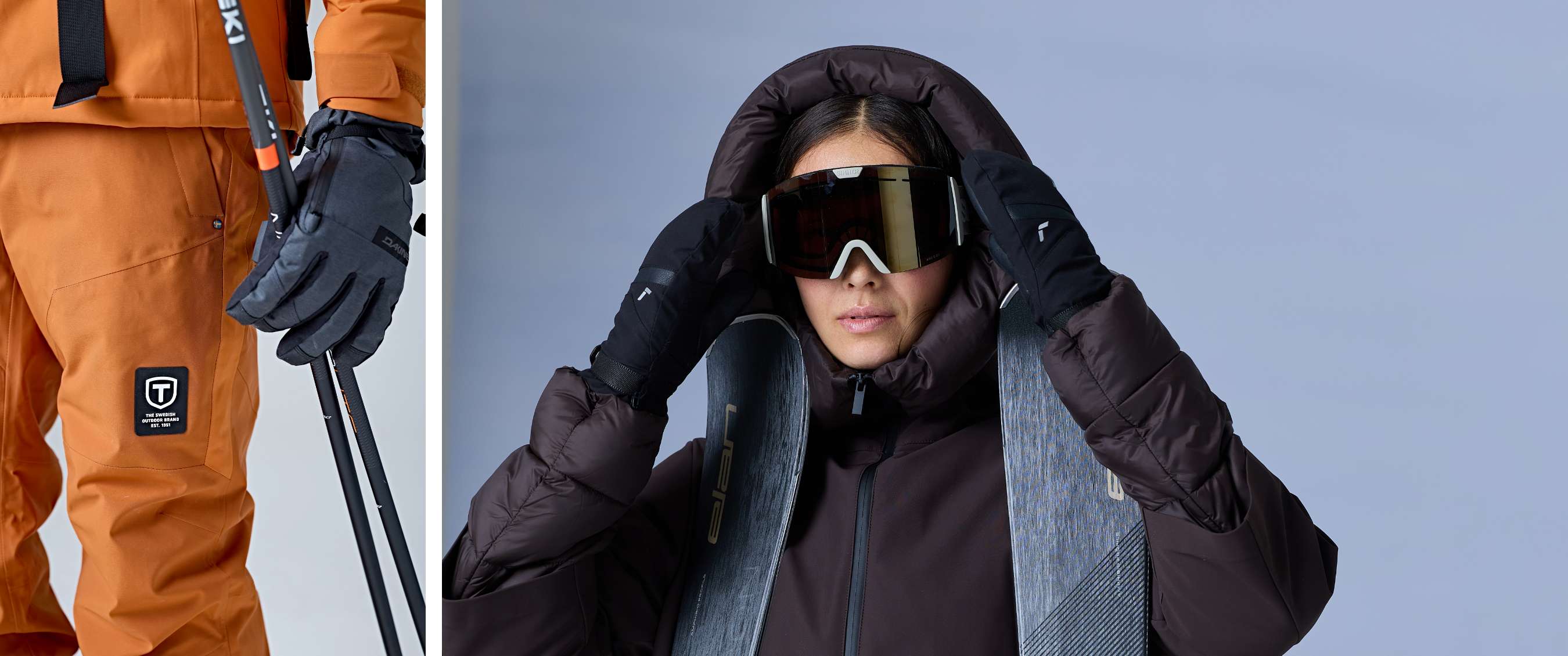 Een vrouw met zwarte wanten en skibril houdt haar capuchon vast, met twee ski's voor haar schouders.