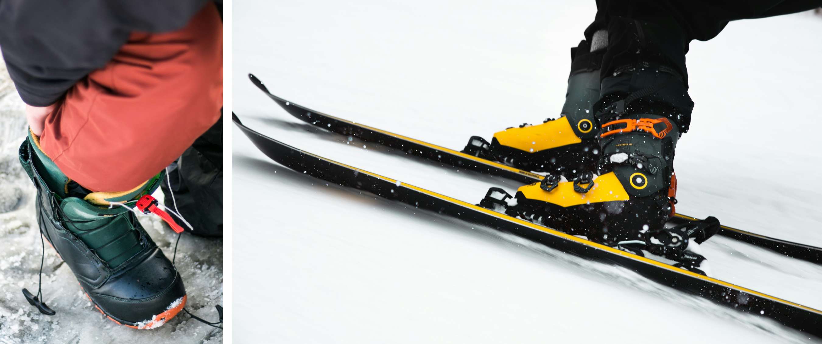 Detail van skischoenen met oranje gespen en zwarte skibroekspijpen boven de bindingen.